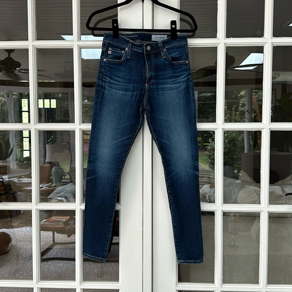 AG jeans, deep denim wash, ankle length and high waist. Size 28.